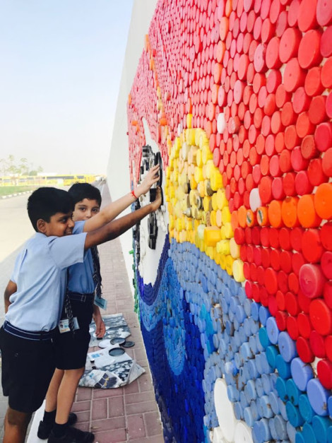 life below water activism art wall plastic bottle taps dubai