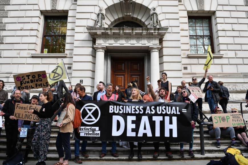 Extinction Rebellion Climate Emergency UK first country