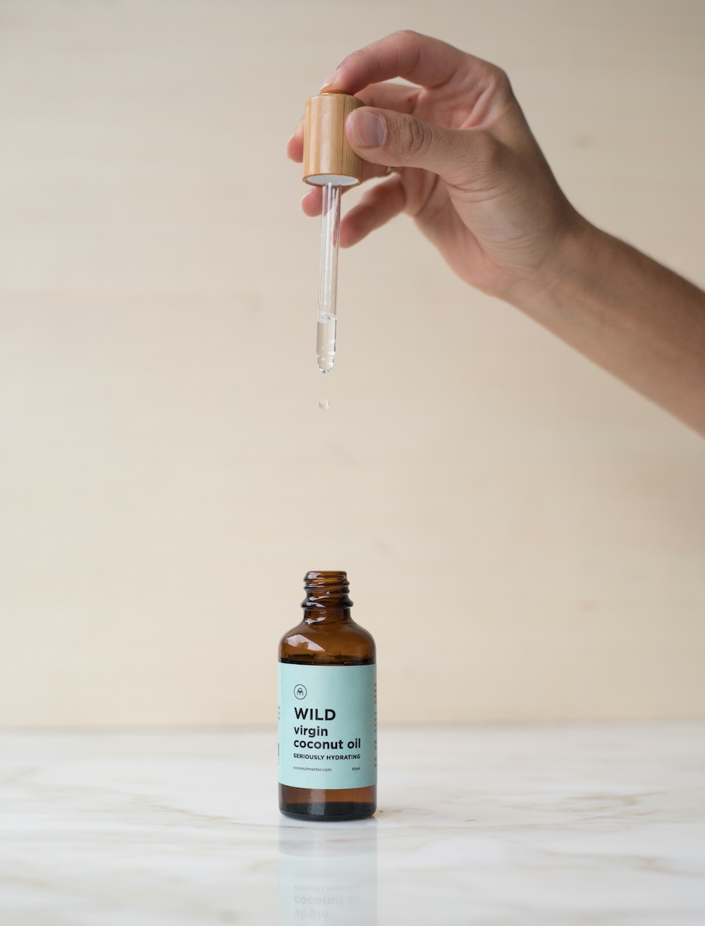Clean beauty Wild virgin coconut oil pump packaging Coconut Matter