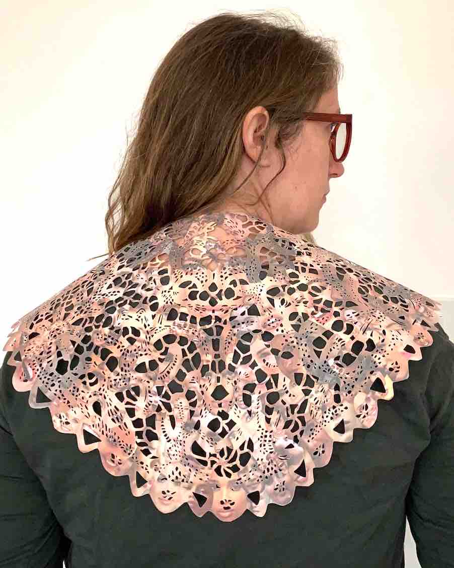 Fashion artactivist repurposes magazines to speak up for garment workers
