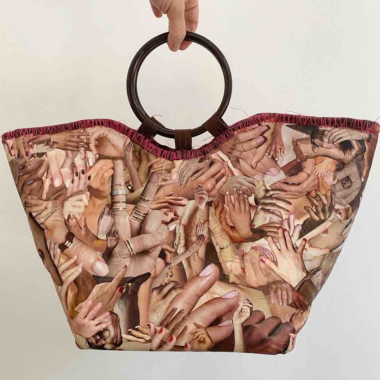 Fashion artactivist repurposes magazines to speak up for garment workers